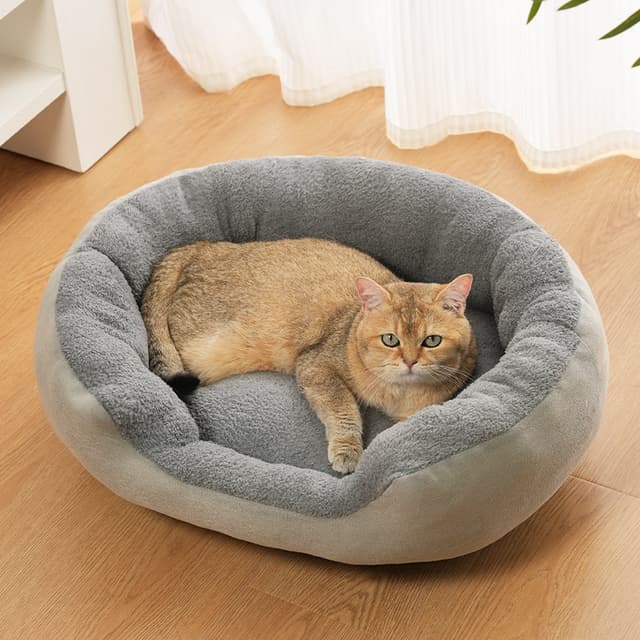 Supplier photo of Plush Oval Pet Bed - Thickened High Wall Dog Cat Sleeping Pad Warm Winter Autumn Soft Cushion For Small Medium Pets Indoor